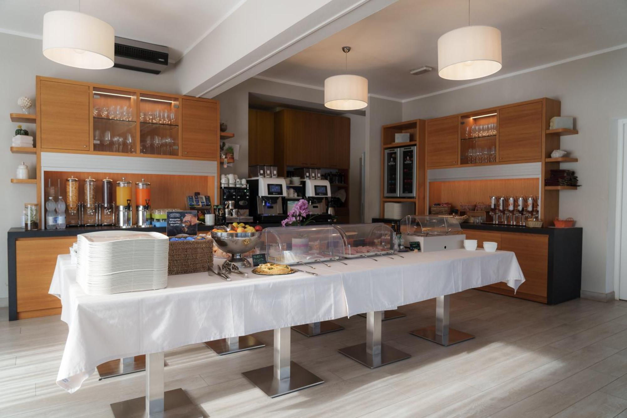 Hotel Dino กาโปลิเวรี ภายนอก รูปภาพ