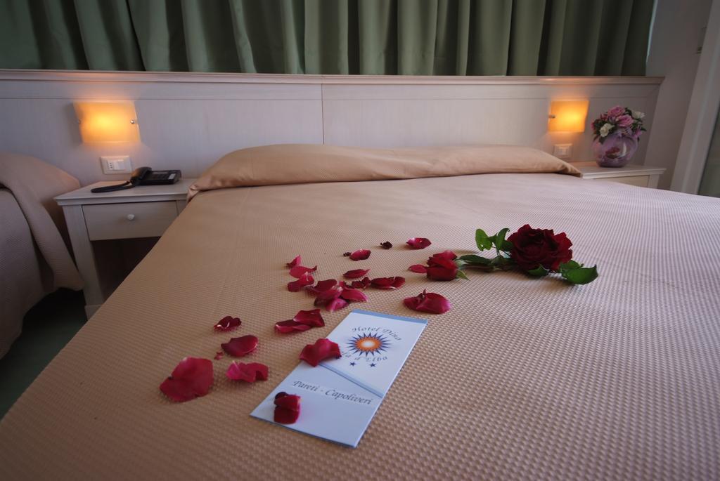 Hotel Dino กาโปลิเวรี ภายนอก รูปภาพ